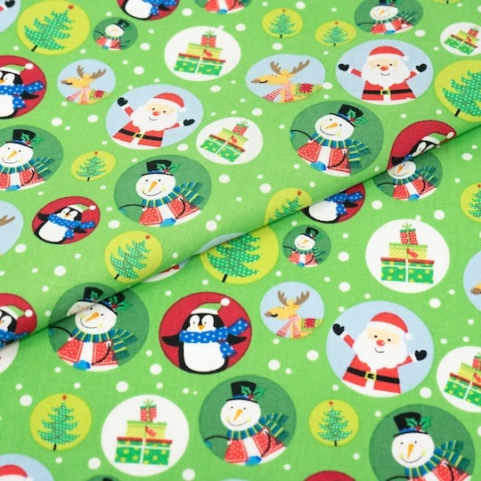 SINGER Christmas Snowglobes On Green Cotton Fabric 3 SINGER Christmas Snowglobes On Green Cotton Fabric